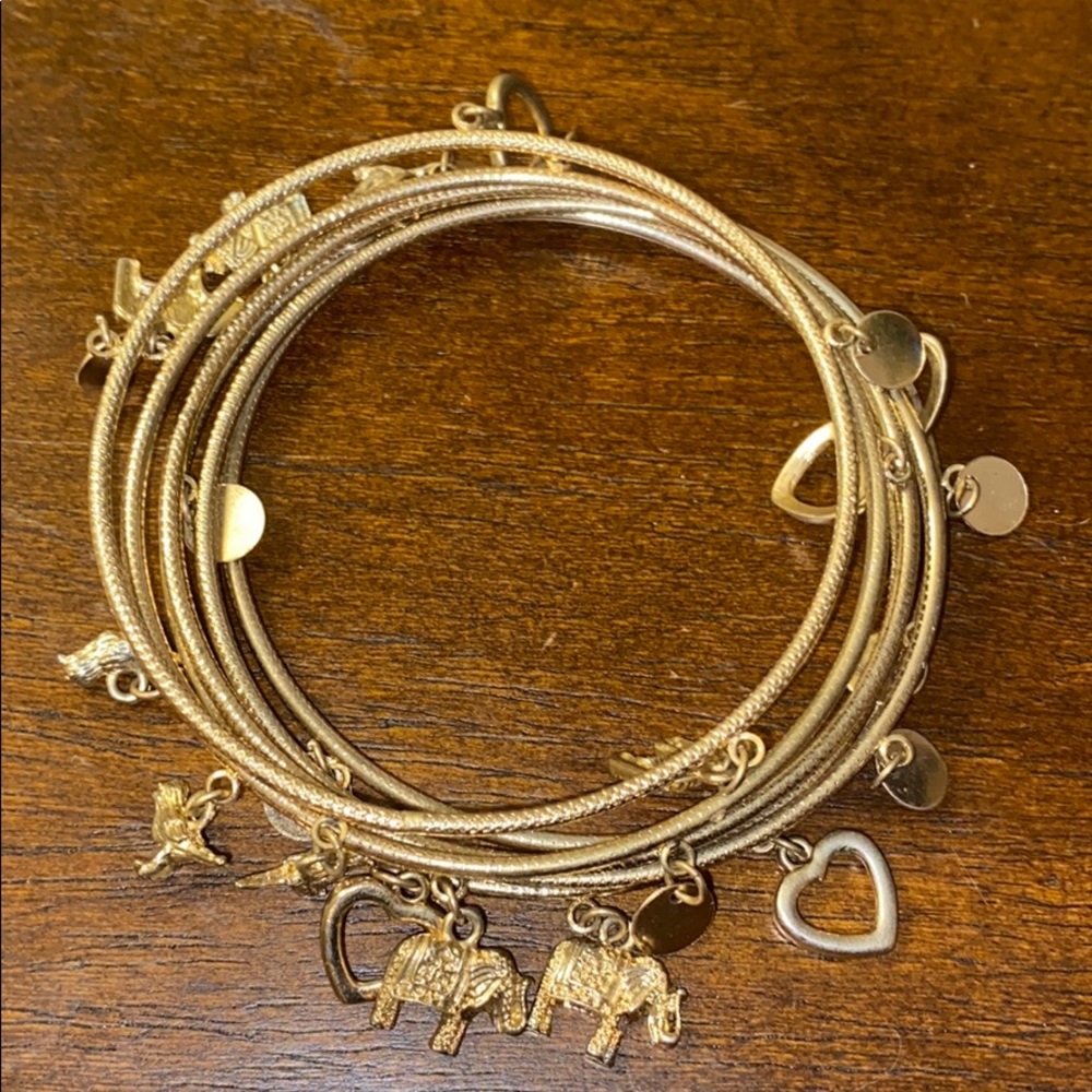 6 gold bangles. Elephants, birds, & heart charms